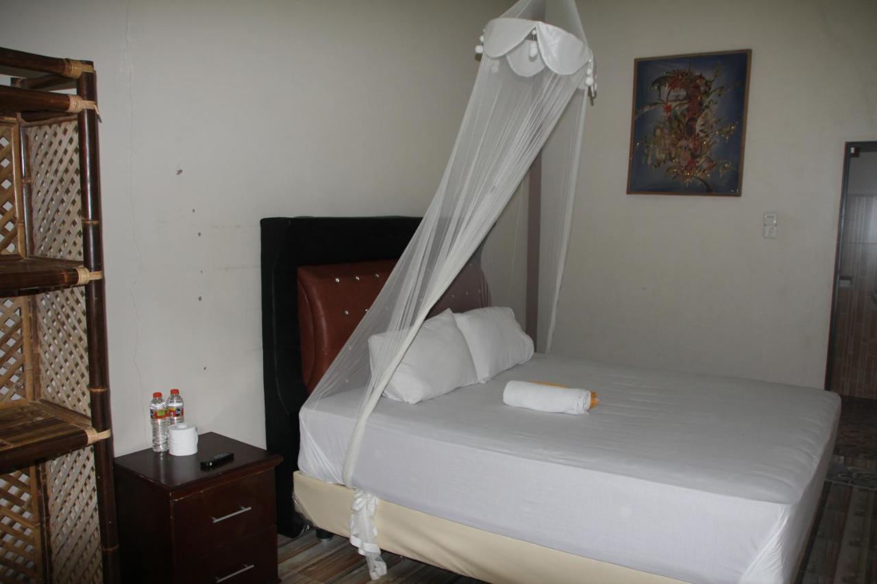 Hotel Thomas' Retreat Bukit Lawang Esterno foto